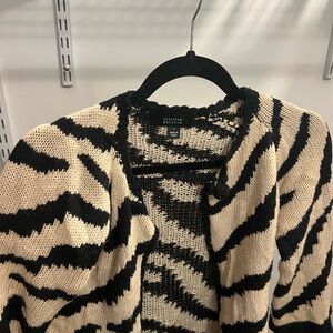 Elegant Zebra Stripe Cardigan in Black and Cream
